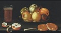 Still Life With Apples And Other Fruit On A Tazza, Together With A Glass Of Beer - Cornelis Jacobsz Delff