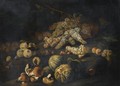 Still Life With Mushrooms, Bunches Of Grapes, Melons And Other Fruit Arranged Over Rocky Ground - Marco Antonio Rizzi