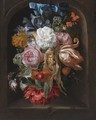 A Still Life Of A Corncob, Roses, A Parrot Tulip, Irises, And Other Flowers Suspended From A Blue Ribbon, In A Stone Niche - Ernst Stuven