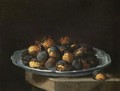 Still Life With Roasted Chestnuts On A White Plate Resting On A Stone Ledge - Giacomo Ceruti (Il Pitocchetto)