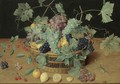 A Still Life With Fruit In A Basket, Including Bunches Of Grapes And Lemons, Cherries And Oranges On The Wooden Table Beneath - Isaak Soreau