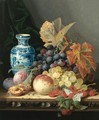 Still Life With A Chinese Vase, Grapes, Plums, Raspberries And A Peach On A Carved Wooden Tabletop - Edward Ladell