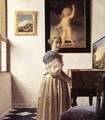 Lady Standing at a Virginal c. 1670 - Jan Vermeer Van Delft